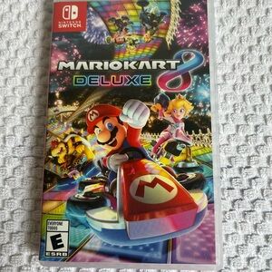Nintendo Mario Kart 8 Deluxe — Red, Blue, Purple Cover